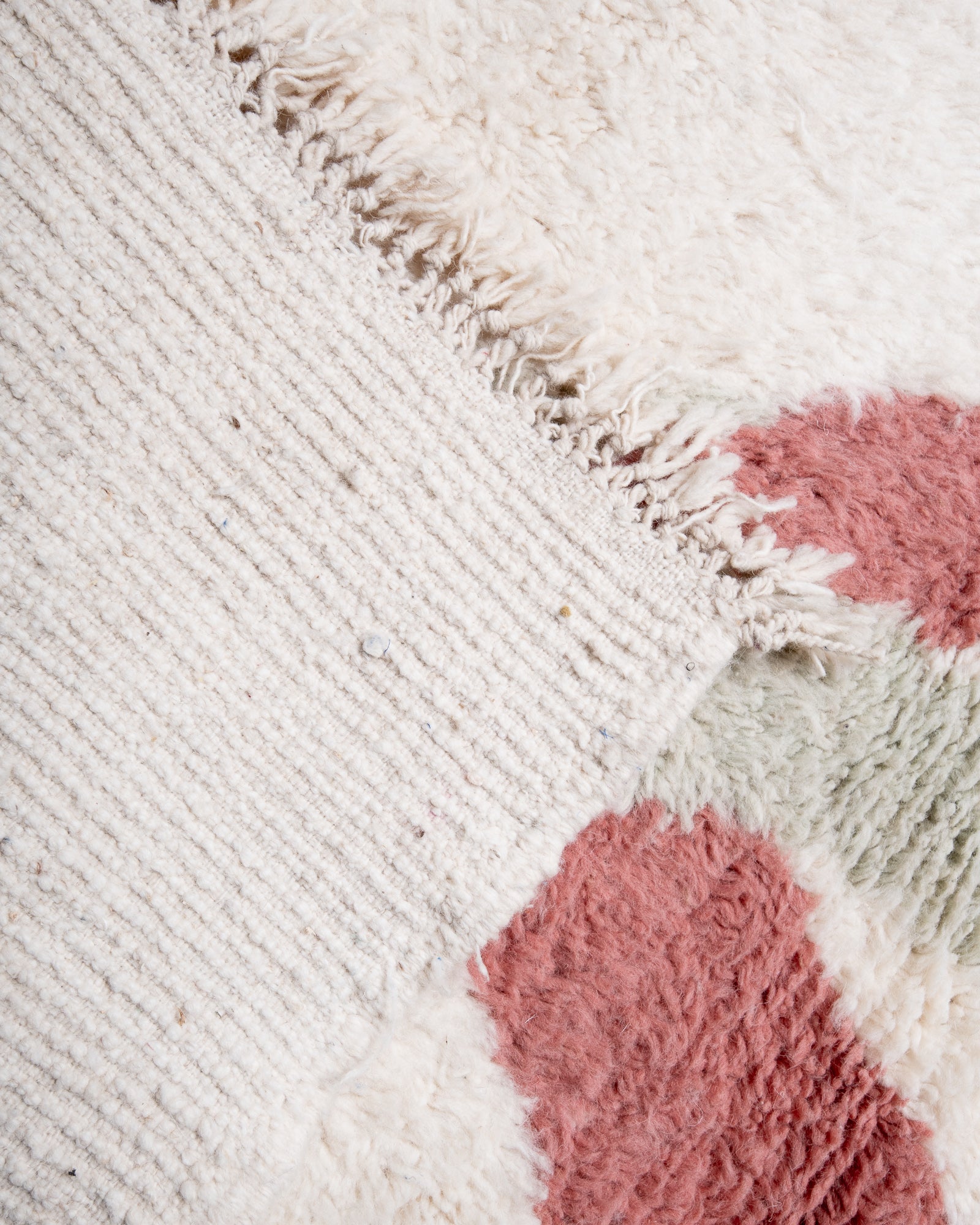 Modern, designer, handcrafted Berber rug from Morocco. Beniourain carpet with beautiful colours and patterns and fluffy wool texture.